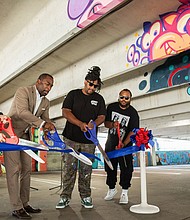Mayor Levar M. Stoney, City Council member Stephanie Lynch, along with artists Silly Genius and Chis Visions, opened the public art initiative titled “Part of Parking Lot Pieces” and “Carytown Street Art Jam” on July 15 at the Carytown Garage.