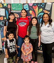 Harris County Clerk Teneshia Hudspeth with the Hernandez family at the Back-to-School Birth Certificate Event that took place at the Pasadena Annex on Saturday, July 29, 2023.