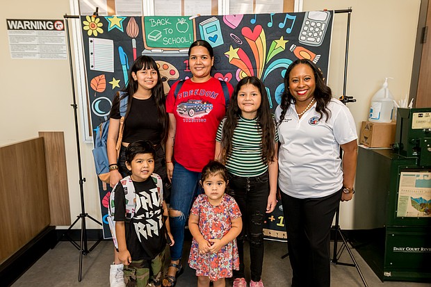 Harris County Clerk Teneshia Hudspeth with the Hernandez family at the Back-to-School Birth Certificate Event that took place at the Pasadena Annex on Saturday, July 29, 2023.