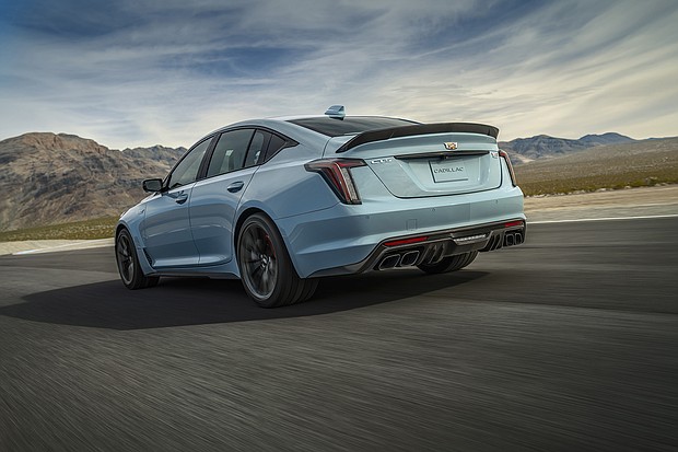Rear view of the 2025 Cadillac CT5-V Blackwing Precision Package in Drift Metallic driving on-track.