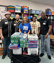 Lyons Elementary School Teacher, Amanda Torres (center), was one of three local teachers who received electronics and supplies for a Classroom Makeover from J.D. Silva & Associates during their 2023 Back-to-School Giveaway. Photos: J.D. silva & Associates