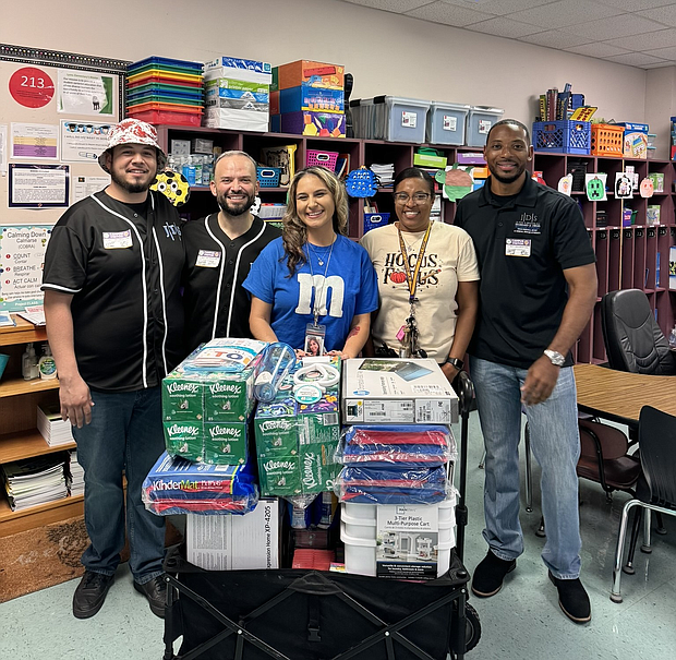 Lyons Elementary School Teacher, Amanda Torres (center), was one of three local teachers who received electronics and supplies for a Classroom Makeover from J.D. Silva & Associates during their 2023 Back-to-School Giveaway. Photos: J.D. silva & Associates