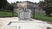 A stone bench that sat near a burial marker to Confederate soldiers at a utility substation is now gone.