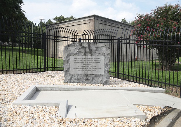 A stone bench that sat near a burial marker to Confederate soldiers at a utility substation is now gone.