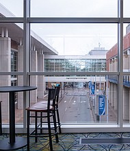 The view from a dining area in the Greater Richmond Convention Center looking east on Marshall Street in Downtown Richmond. The convention center opened in 2003 and includes 178,159 square feet of exhibit space, a 30,550-square-foot grand ballroom and 50,000 square
feet of meeting room space.