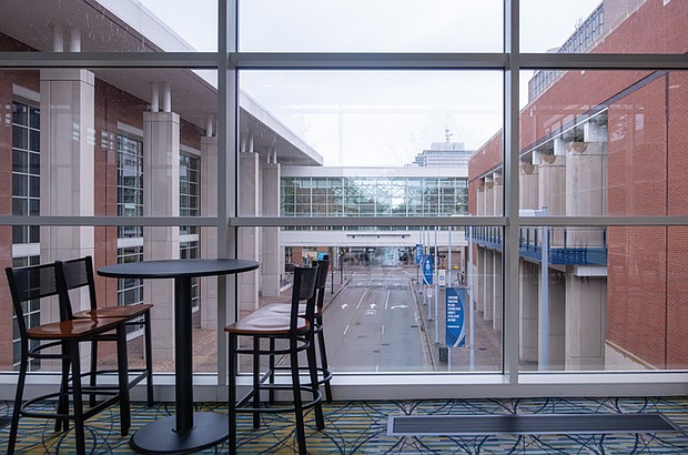 The view from a dining area in the Greater Richmond Convention Center looking east on Marshall Street in Downtown Richmond. The convention center opened in 2003 and includes 178,159 square feet of exhibit space, a 30,550-square-foot grand ballroom and 50,000 square
feet of meeting room space.