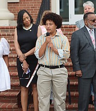 Briana Brown and AD Carter speak June 11 in front of the Shenandoah County Circuit Court.