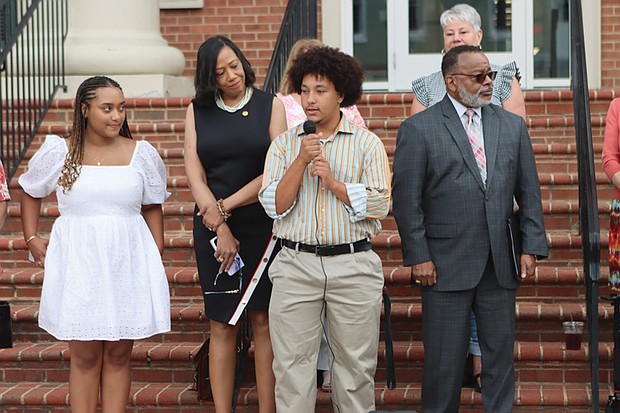 Briana Brown and AD Carter speak June 11 in front of the Shenandoah County Circuit Court.