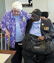 Freedom Riders Joan Browning and Charles Person chat July 26 at Emory University in Atlanta. They were activists
who rode buses into the Deep South in 1961, aiming to desegregate interstate transportation. Browning and Person are donating their archives to the Emory University.