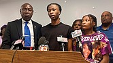 Malachi Hill Massey, 17, center, speaks at a news conference, July 23 at the NAACP headquarters in Springfield, Ill., about his mother, Sonya Massey, who was shot to death by a Sangamon County sheriff’s deputy July 6 in Springfield after calling 911 for help. On the left is civil rights attorney Ben Crump, who is representing the Massey family. On the right is Sonya Massey’s daughter, Jeanette Summer Massey, 15.