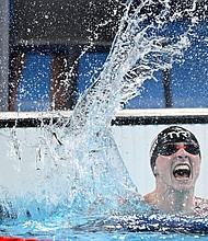 Katie Ledecky of the USA celebrates victory after winning the Women's 1500m Swimming Final on day five of the Olympic Games Paris 2024 at Paris La Defense Arena on July 31, 2024, in Nanterre, France.
Mandatory Credit:	Bradley Kanaris/Getty Images via CNN Newsource