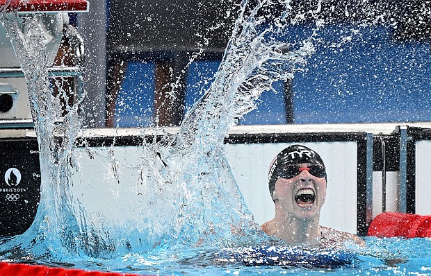 Katie Ledecky of the USA celebrates victory after winning the Women's 1500m Swimming Final on day five of the Olympic Games Paris 2024 at Paris La Defense Arena on July 31, 2024, in Nanterre, France.
Mandatory Credit:	Bradley Kanaris/Getty Images via CNN Newsource