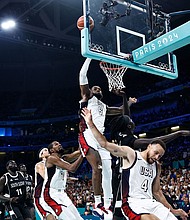USA's #06 LeBron James takes a rebound in the men's preliminary round group C basketball match between USA and South Sudan during the Paris 2024 Olympic Games at the Pierre-Mauroy stadium in Villeneuve-d'Ascq, northern France, on July 31, 2024.
Mandatory Credit:	Sameer Al Doumy/AFP/Getty Images via CNN Newsource