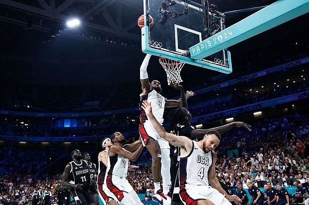 USA's #06 LeBron James takes a rebound in the men's preliminary round group C basketball match between USA and South Sudan during the Paris 2024 Olympic Games at the Pierre-Mauroy stadium in Villeneuve-d'Ascq, northern France, on July 31, 2024.
Mandatory Credit:	Sameer Al Doumy/AFP/Getty Images via CNN Newsource