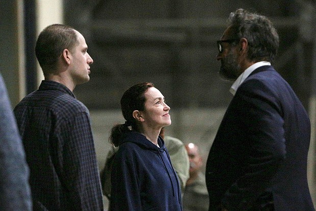 Evan Gershkovich and Alsu Kurmasheva speak with Special Presidential Envoy for Hostage Affairs Roger Carstens at Kelly Field in San Antonio, Texas, August 2, 2024.
Mandatory Credit:	Kaylee Greenlee Beal/Reuters via CNN Newsource