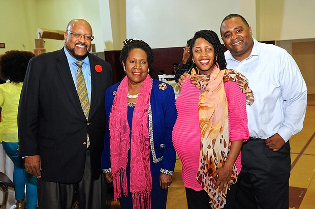 The late Congresswoman Sheila Jackson Lee with her husband, Elwyn Lee, and daughter, Erica Lee Carter, and son-in-law, Roy Carter