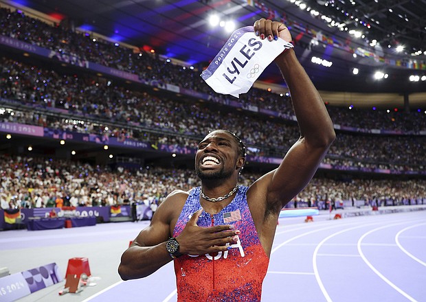 Noah Lyles celebrates winning the gold medal in the men's 100m final on day nine of the 2024 Olympic Games.
Mandatory Credit:	Christian Petersen/Getty Images via CNN Newsource