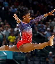 Simone Biles of United States in action.
Mandatory Credit:	Hannah McKay/Reuters via CNN Newsource