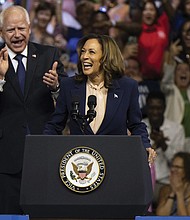 Democratic presidential nominee Vice President Kamala Harris and her running mate Minnesota Gov. Tim Walz at an Aug. 6 campaign rally in Philadelphia.