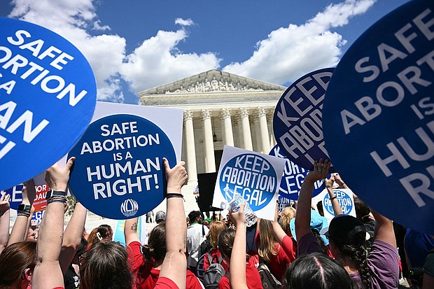 Reproductive rights activists demonstrate in front of the Supreme Court in Washington, DC, on June 24.
Mandatory Credit:	Jim Watson/AFP/Getty Images/File via CNN Newsource