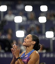 Sydney Mclaughlin-Levrone defended her Olympic title in the 400m hurdles.
Mandatory Credit:	Ben Stansall/AFP/Getty Images via CNN Newsource