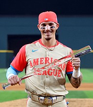 Jarren Duran, seen here holding the Most Valuable Player award he earned for his performance in the 2024 MLB All-Star Game, was suspended on Monday after directing a homophobic slur at a fan.
Mandatory Credit:	Stacy Revere/Getty Images via CNN Newsource