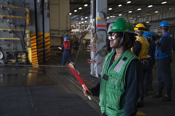 Hailing from Houston, Texas, Seaman **Jacquelyn Klay** is making waves as she stands signalman watch in the hangar bay aboard …