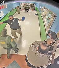 Calls for accountability mounted after the public learned that the gunman was left alone with victims for over an hour during the massacre.
Mandatory Credit:	Texas House Investigative Committee/Reuters via CNN Newsource