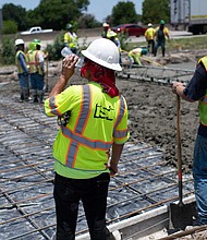 A dangerous and prolonged heat wave blanketed large parts of the southern US on Tuesday, buckling highways and forcing people into air-conditioned shelters as temperatures soared past 115 degrees F, and a construction worker is seen drinking water while repairing a road with heat damage in Houston, Texas on June 27, 2023.
Mandatory Credit:	Mark Felix/AFP/Getty Images via CNN Newsource
