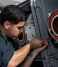 Fire Controlman 3rd Class Martin Galvan
Photo by Seaman Tyler Miles 
USS Boxer (LHD 4)