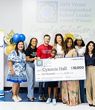 Dr. Asha and Farid Virani present the award check to Cynovia Hall, one of the two 2024 Virani Distinguished School Leader Award winners.
From left to right, top: Tiffany Cuellar Needham (Executive Director, TFA Houston), Danitra Arredondo (Head of Schools, YES Prep), Jared Braun (AP, KIPP Unity), Reagan Fitzpatrick (Cynovia’s daughter), Elizabeth Carlson-Young (Deputy Chief Program Officer, YES Prep), Cynovia Hall (Winner, Virani Distinguished School Leader Award), Judy Pilgrim (Cynovia’s mom), and Dr. Asha and Farid Virani (Founders, Virani Distinguished School Leader Award).