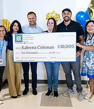 Dr. Asha and Farid Virani present the award check to Kaleena Coleman, one of the two 2024 Virani Distinguished School Leader Award winners.

From left to right: Sehba Ali (CEO, KIPP Texas), Dr. Asha and Farid Virani (Founders, Virani Distinguished School Leader Award), Kaleena Coleman (Winner, Virani Distinguished School Leader Award), Rodney Coleman Jr. (Kaleena’s husband), and Tiffany Cuellar Needham (Executive Director, TFA Houston).