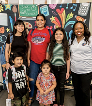 Harris County Clerk Teneshia Hudspeth with the Hernandez family at the Back-toSchool Birth Certificate Event at the Pasadena Annex, Saturday, July 29, 2023.