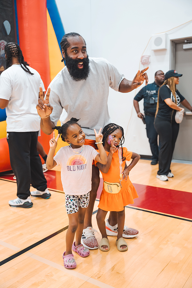 NBA All-Star James Harden grabs a pic with some little fans at his Impact13 Foundation’s 6th Annual JH-Town Weekend.
 
Photo: Courtesy of Impact13 Foundation