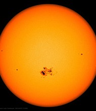 A cluster of sunspots appears on the surface of the sun on October 18, 2014.
Mandatory Credit:	NASA Goddard via CNN Newsource
