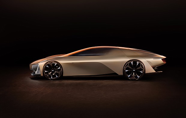 Side view of Cadillac Opulent Velocity concept vehicle in Gilded Pearl exterior color.