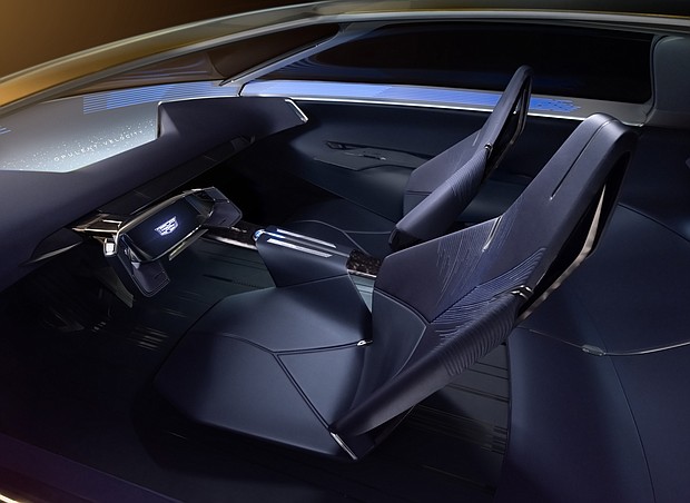 Interior of Opulent Velocity concept vehicle with Selene Metallic dark blue interior, Y-shape steering wheel and HUD screen.