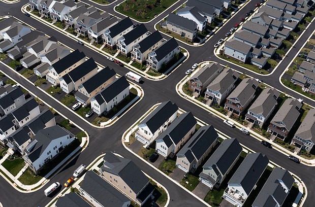 Vice President Kamala Harris plans to announce her campaign's four-year plan to lower housing costs, and pictured are single-family homes in a residential neighborhood in Aldie, Virginia on May 22.
Mandatory Credit:	Nathan Howard/Bloomberg/Getty Images via CNN Newsource