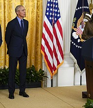 Obama and President Joe Biden listen as Harris speaks at the White House on April 5, 2022, about the Affordable Care Act.
Mandatory Credit:	Carolyn Kaster/AP via CNN Newsource