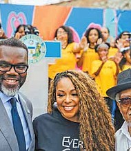 Mayor Brandon Johnson, with Polished Pebbles Founder Kelly Fair and Local Author and Historian Pemon Rami during the launch of South Side Sanctuary. PHOTO BY KORY POWELL.