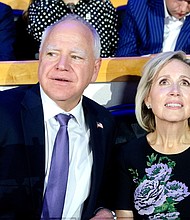 Democratic vice presidential candidate Minnesota Gov. Tim Walz, at left, and Minnesota First Lady Gwen Walz attend the first day of the Democratic National Convention at the United Center on August 19, in Chicago, Illinois.
Mandatory Credit:	Jacek Boczarski/Anadolu/Getty Images via CNN Newsource