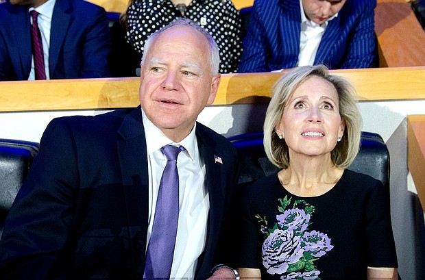Democratic vice presidential candidate Minnesota Gov. Tim Walz, at left, and Minnesota First Lady Gwen Walz attend the first day of the Democratic National Convention at the United Center on August 19, in Chicago, Illinois.
Mandatory Credit:	Jacek Boczarski/Anadolu/Getty Images via CNN Newsource
