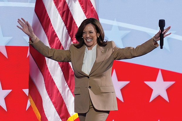 Democratic presidential nominee Vice President Kamala Harris walks on stage Monday during the Democratic National Convention Chicago.