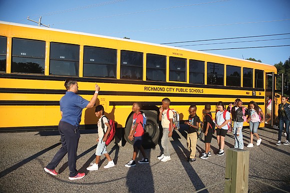 G.H. Reid Elementary School hosted a welcome back cheer-on for students arriving for the first day of school on Monday …