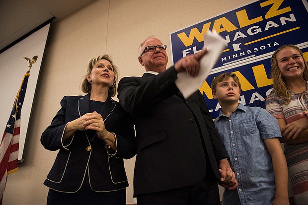 Gwen Walz, left, stands next to her husband Tim Walz and their children Gus and Hope, during an election night party in St. Paul, Minnesota on August 14, 2018, the night Tim Walz became the Minnesota Democratic–Farmer–Labor Party's candidate for governor.
Mandatory Credit:	Stephen Maturen/Getty Images/File via CNN Newsource