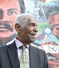 Richard Waller Jr., 86, the third-generation jeweler of the 124-year-old Waller & Co. Jewelers, stood in front of a mural depicting his family’s legacy outside the business at 19 E. Broad St. on Aug. 14. The mural, painted by local artist Ed Trask in 2011, will soon be covered by new construction, marking the end of an era for the storied jewelry store. Waller posed for solo portraits, photos with family and friends, and with longtime loyal customers, memorializing the artwork before it disappears.