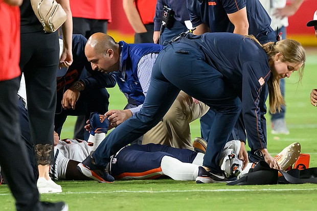 Chicago Bears safety Douglas Coleman III is treated on the field after being injured during a game against the Kansas City Chiefs on August 22 in Kansas City.