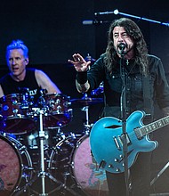 (From left) Foo Fighters drummer Josh Freese and Dave Grohl performing at the Roskilde Festival in Denmark in July.
Mandatory Credit:	Helle Arensbak/Ritzau Scanpix/AFP/Getty Images via CNN Newsource