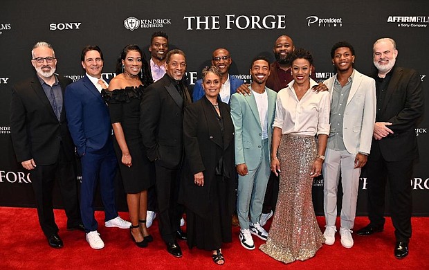 [L-R] Stephen Kendrick, Tommy Woodard, Anna Douglas, Ben Watson, Cameron Arnett, BJ Arnett, Ken Bevel, Aspen Kennedy, Jerry Shirer, Priscilla Shirer, Jerry Jr., and Alex Kendrick arrived on the red carpet at the premiere of Sony Pictures' AFFIRM Films' movie 'The Forge'.Photo Credit: Paras Griffin, courtesy of Affirm Films