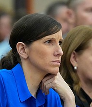 Kouri Richins, a Utah mother of three who is accused of fatally poisoning her husband, looks on during a court hearing Tuesday, Aug. 27, 2024, in Park City, Utah.
Mandatory Credit:	Rick Bowmer/Pool/AP via CNN Newsource